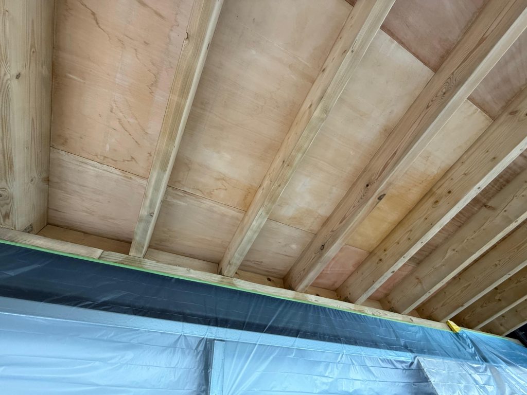 Timber joists and plywood ceiling before fire retardant coating
